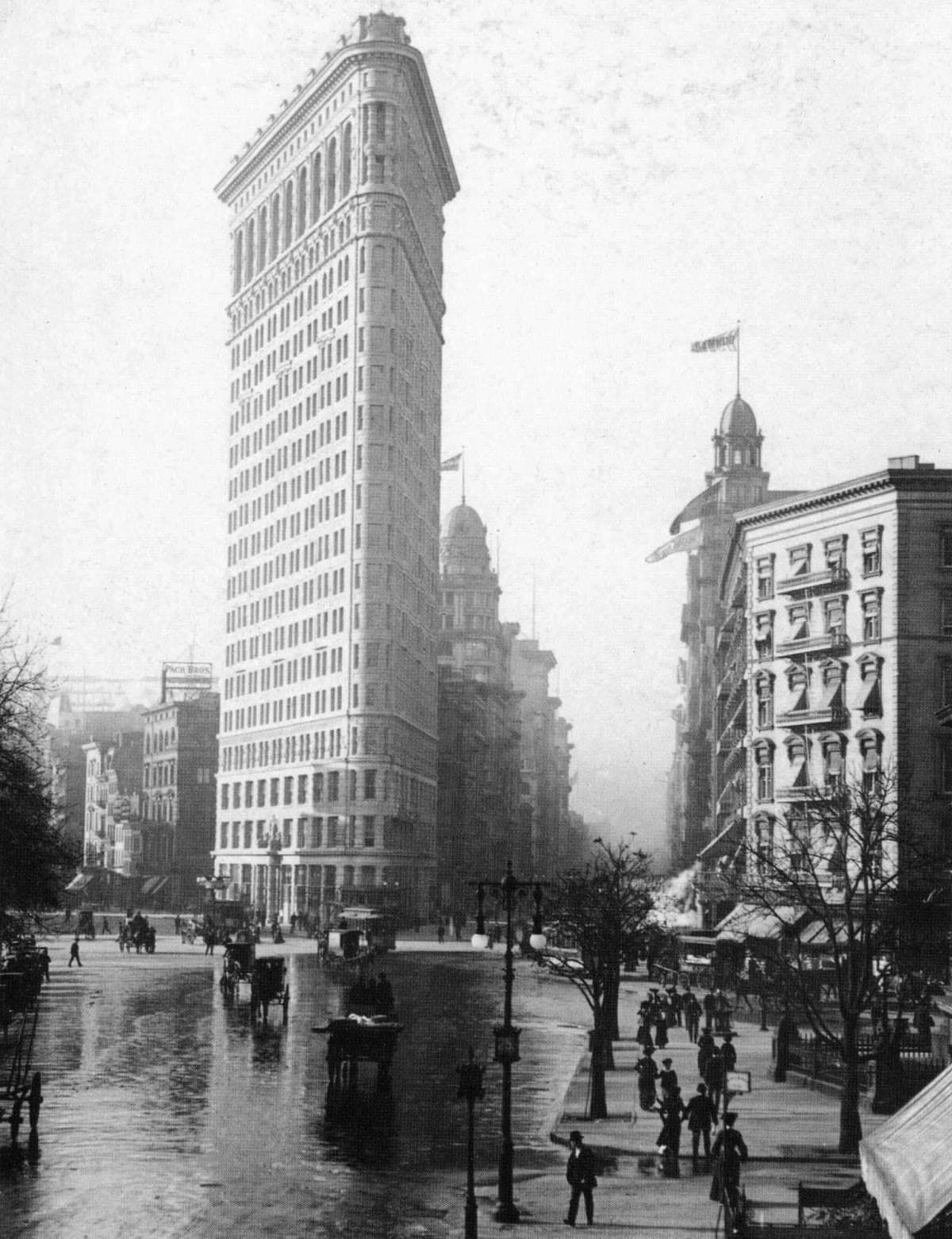 The Flatiron Building and the corner of Broadway and Fifth Avenue around 1903